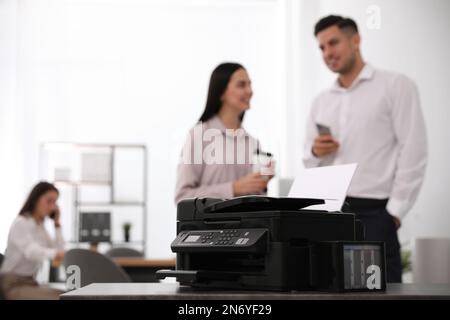 New modern printer on table in office. Space for text Stock Photo