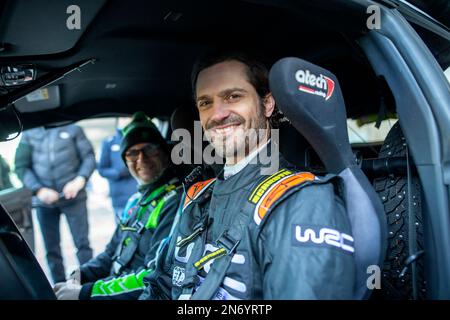 Prince Carl Philip of Sweden drives a Toyota Yaris on Red Barn Arena with co-driver and former rally driver Petter Solberg, during a visit to the serv Stock Photo