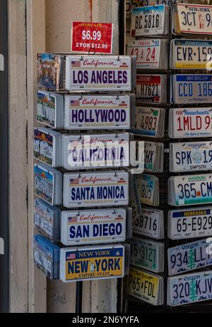 A picture of many American souvenir license plates on sale. Stock Photo