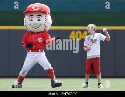 Cincinnati Reds' mascot Mr. Red dances prior to a baseball game