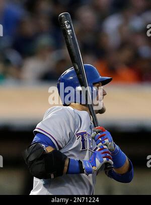 Texas Rangers' A.J. Pierzynski watches his home run during the ninth inning  of a baseball game against the Los Angeles Angels in Anaheim, Calif.,  Monday, April 22, 2013. (AP Photo/Jae C. Hong