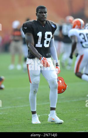 Cleveland Browns wide receiver Greg Little, left, is tackled by Miami  Dolphins cornerback Will Allen after a short gain in the fourth quarter at Cleveland  Browns Stadium in Cleveland, Ohio, Sunday, September