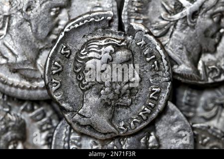 Roman silver denarius coin showing portrait of emperor Antoninus Pius Stock Photo