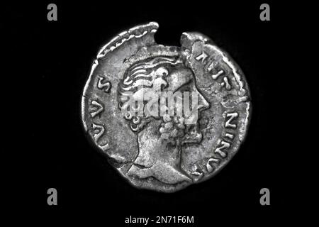 Roman silver denarius coin showing portrait of emperor Antoninus Pius Stock Photo