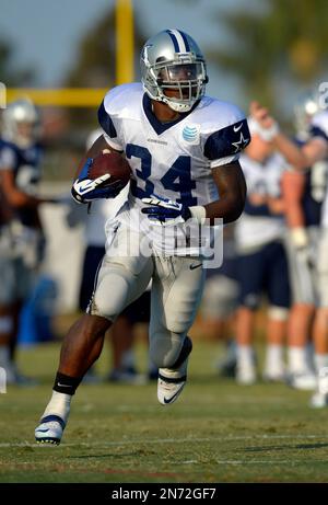 Nov. 6, 2011 - Arlington, Texas, United States of America - Dallas Cowboys  running back Phillip Tanner (34) looks for the hole during game action as  the Seattle Seahawks face-off against the