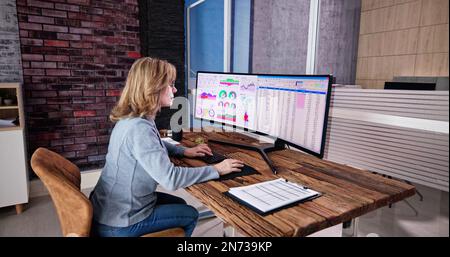 Business Data Audit Spreadsheet On Analyst Computer Stock Photo