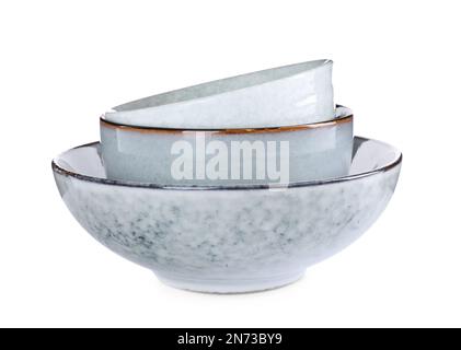 Stack of ceramic bowls on white background Stock Photo