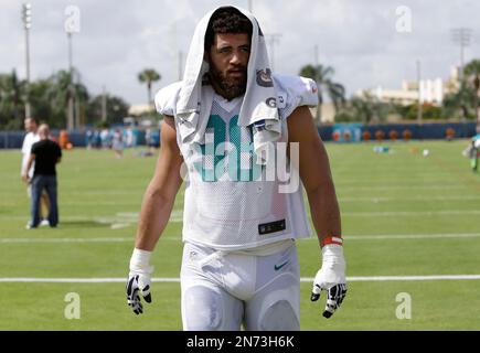 Miami Dolphins defensive end Jared Odrick (98) walks onto the