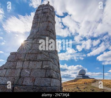 Vosges (Vogesen) Mountains, hiker at mountain Grand Ballon (Großer Belchen), Memorial Diables Bleus Grand Ballon in Alsace (Elsass), Haut-Rhin (Oberelsass), France Stock Photo