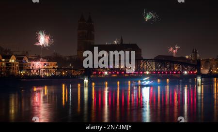 New Year's Eve rockets, Magdeburg Cathedral, lift bridge, Magdeburg, Saxony-Anhalt, Germany Stock Photo
