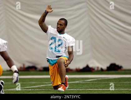 Miami Dolphins cornerback Jamar Taylor (22) deflects a pass intended for  Chicago Bears wide receiver Brandon Marshall (15) in the final seconds of  the fourth quarter on Sunday, Oct. 19, 2014, at