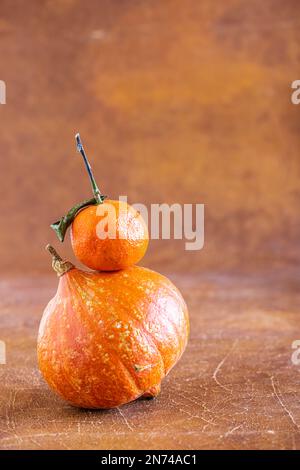 Food still life with pumpkin and clementine, fruit and vegetables Stock Photo