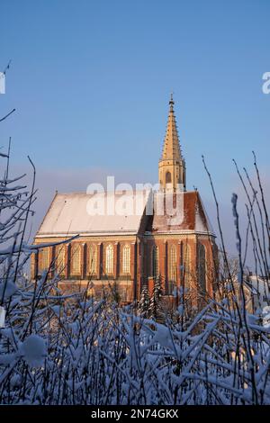 Germany, Bavaria, Upper Bavaria, Altötting district, Neuötting, St. Nicholas parish church, in winter Stock Photo