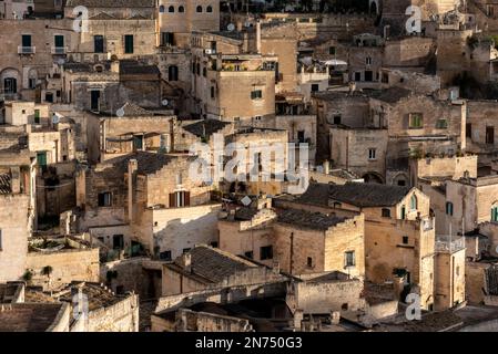 Residential cave houses in historic downtown Matera, Italy Stock Photo