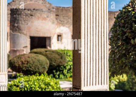 Pompeii, Italy, Colonnade and garden in the Roman villa Praedia of Giulia Felice in Pompeii, Southern Italy Stock Photo