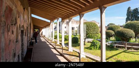 Pompeii, Italy, Colonnade and garden in the Roman villa Praedia of Giulia Felice in Pompeii, Southern Italy Stock Photo