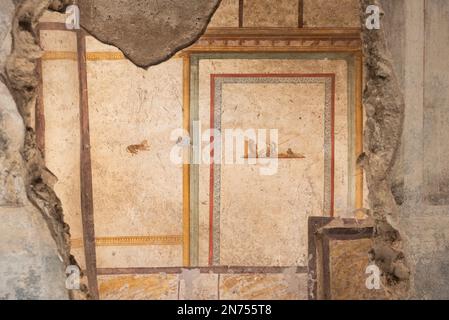 Scenic ancient frescoes in a room of a Pompeiian villa, Southern Italy Stock Photo