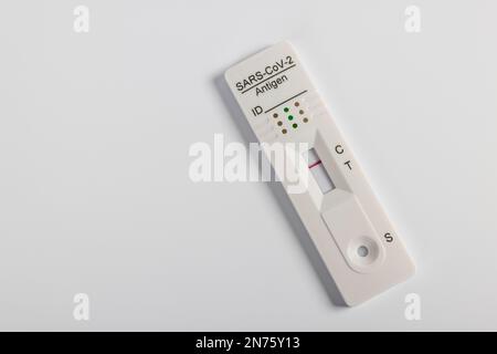 Rapid SARS-CoV-2 Antigen Test Cassette with negative test result, white background, Stock Photo