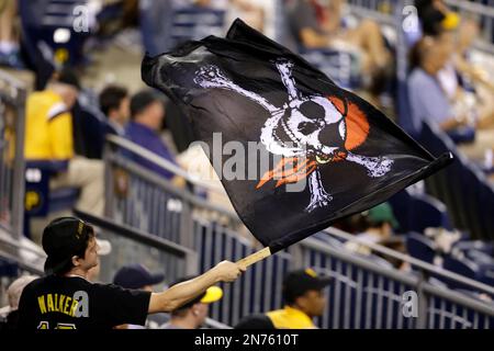 A Pittsburgh Pirates fan waves a Jolly Roger during the opening