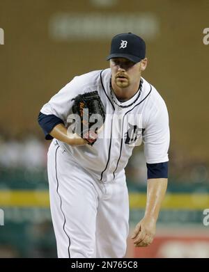 Detroit Tigers relief pitcher Phil Coke prepares to throw during the eighth  inning of a baseball game against the Chicago White Sox in Detroit,  Tuesday, July 9, 2013. (AP Photo/Carlos Osorio Stock