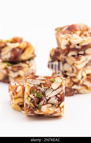 Khajur Barfi Or Khajoor Dry Fruits Burfi Made Of Dates, Anjeer, Kaju, Cashew Nuts, Raisins, Kismis, Pista, Poppy Seeds, Almonds, Pistachio, Badam, Maw Stock Photo