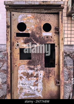 electrical panel old rusty, looks like a vintage robot Stock Photo