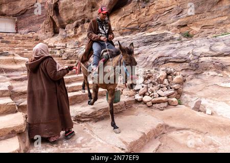 Petra, Jordan. 10th Feb, 2023. Bedouins work in Petra, a famous archaeological site in Jordan on February 10, 2023. Petra is a UNESCO World Heritage site and one of the seven wonders of the world. It is an ancient Nabataean capital, today inhabited by The Bidoul bedouins. (Photo by Dominika Zarzycka/Sipa USA) Credit: Sipa USA/Alamy Live News Stock Photo