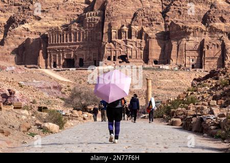 Petra, Jordan. 10th Feb, 2023. Tourists walk in front of Royal Tombs in Petra, a famous archaeological site in Jordan on February 10, 2023. Petra is a UNESCO World Heritage site and one of the seven wonders of the world. It is an ancient Nabataean capital, today inhabited by The Bidoul bedouins. (Photo by Dominika Zarzycka/Sipa USA) Credit: Sipa USA/Alamy Live News Stock Photo