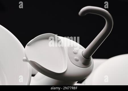 Dental Spittoon and glass sink. Washbasin in dentist cabinet. Spit sink at dentisl office. Stomatological equipment Stock Photo