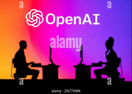 NEW YORK, USA, 25. JANUARY 2023: Collaborating for the Future: A Silhouette of OpenAI Web Developers at Work. Brainstorm, Artificial Intelligence. Tea Stock Photo