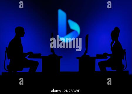JAPAN, TOKYO. JANUARY 30, 2023: Bing Collaboration Leads to Progress: Two Developers Working Together Under the Company's Logo Stock Photo