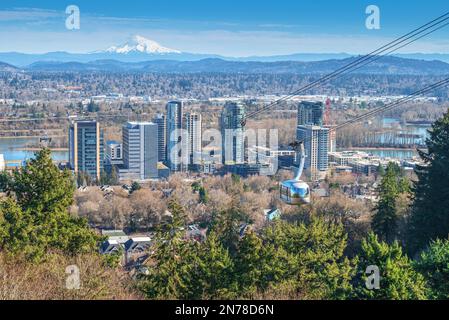 Aerial tram transporting people to the top of the hill in Portland Oregon. Stock Photo