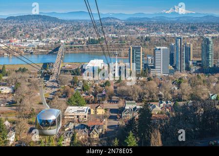 Aerial tram transporting people to the top of the hill in Portland Oregon. Stock Photo