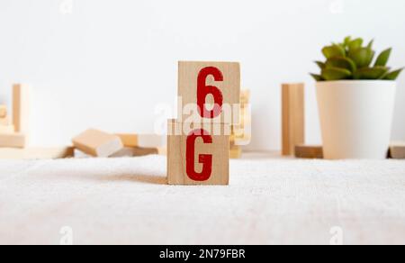 The 3d rendering 6g text gold surface glow in dark image for mobile technology content. Stock Photo