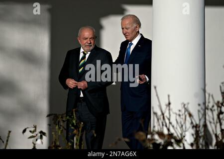 Washington DC, USA. 10th Feb, 2023. US President Joe Biden, right, and Luiz Inacio Lula da Silva, Brazil's president, walk through the Colonnade of the White House, DC, US, on Friday, Feb. 10, 2023. Biden is hosting Lula in a show of support for Brazilian democracy, shaken last month by a right-wing insurrection akin to the invasion of the US Capitol in 2021. Photo by Andrew Harrer/UPI . Credit: UPI/Alamy Live News Stock Photo