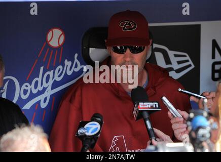 Los Angeles Dodgers Kirk Gibson raises his arm in celebration as