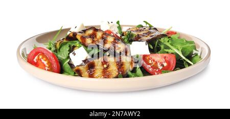 Delicious salad with roasted eggplant, feta cheese and arugula isolated on white Stock Photo