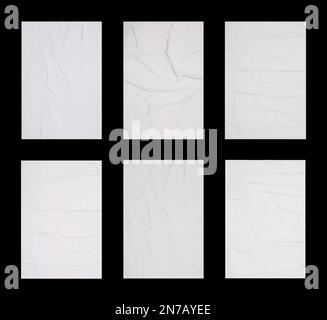 Collection of creased blank posters on black background Stock Photo