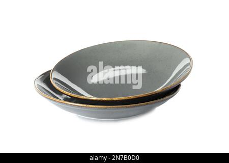 New grey ceramic plates on white background Stock Photo
