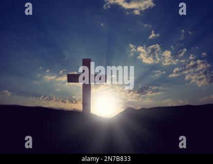 Christian cross on hill outdoors at sunrise. Resurrection of Jesus ...