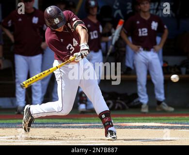 Mississippi State's C.T. Bradford (10), Adam Frazier (12) and