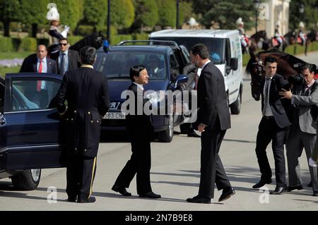 Spain's Crown Prince Felipe, centre right, shakes hands with Japan's Crown Prince Naruhito, during a welcome ceremony, at the Pardo Palace, near Madrid, Monday, June 10, 2013. Crown Prince Naruhito launched a celebration of Japan's 400-year relationship with Spain on a visit that will take him to a curious town where many residents still carry the name 'Japon' to honor the Japanese who visited in the 17th century. (AP Photo/Andres Kudacki)