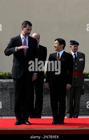 Spain's Crown Prince Felipe, left, and Japan's Crown Prince Naruhito, as they review royal guard troops during the welcome ceremony, at the Pardo Palace, near Madrid, Monday, June 10, 2013. Crown Prince Naruhito launched a celebration of Japan's 400-year relationship with Spain on a visit that will take him to a curious town where many residents still carry the name 'Japon' to honor the Japanese who visited in the 17th century. (AP Photo/Andres Kudacki)