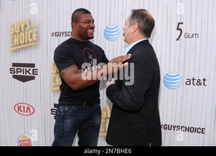 Quinton Jackson, Left, And Kevin Kay, President Of Spike Tv, Arrive At 