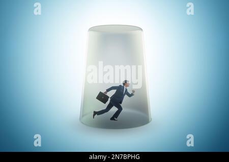 Businessman trapped in the transparent glass Stock Photo