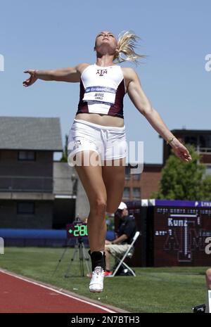 Annie Kunz, of the United States, competes in the high jump of the ...