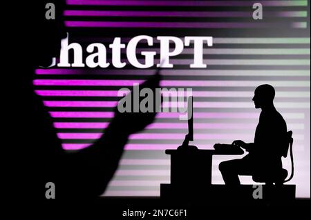 UK, LONDON. JANUARY 30, 2023: ChatGPT. The Intersection of Personal and Professional: Silhouette of Man and Web Developer Stock Photo