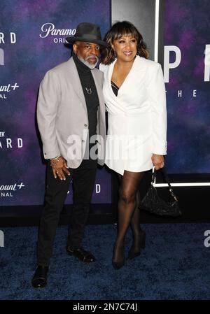 HOLLYWOOD, CALIFORNIA - FEBRUARY 09: (L-R) LeVar Burton and Stephanie Cozart Burton arrive for the Los Angeles premiere of the third and final season Stock Photo