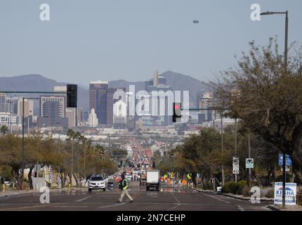 Phoenix, United States. 09th Feb, 2023. Automobile and pedestrian traffic exist on a road leading to the downtown area of Phoenix in Phoenix, Arizona on Friday, February 10, 2023. The Philadelphia Eagles will play the Kansas City Chiefs in Super Bowl LVII at State Farm Stadium in Glendale, Arizona on Sunday, February 12th, 2023. Photo by John Angelillo/UPI Credit: UPI/Alamy Live News Stock Photo