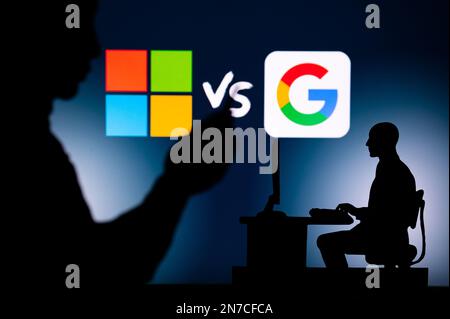 LOS ANGELES, USA, JANUARY 30, 2023: Microsoft vs Google. Artificial Intelligence war. The Intersection of Personal and Professional: Silhouette of Man Stock Photo